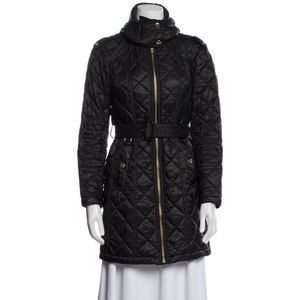 •   Burberry Coat
•   With Hood
•   Stand Collar
•   Knee-Length
•   Zip Closure